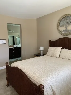 Great family friendly home very private back yard, heated pool & covered patio.
