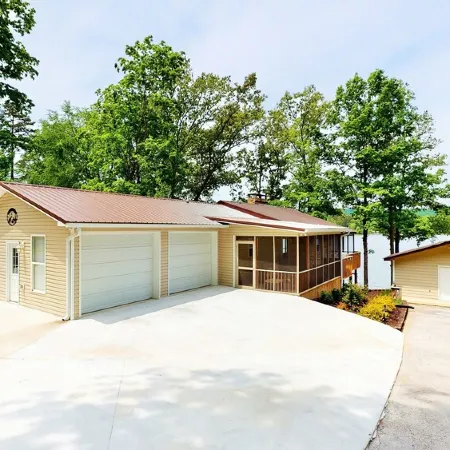 Lake Front house on Watts Bar Lake with large private dock, 2 screen porches