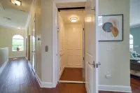 Coastal Elegance: Retreat with Heated Pool, Golf Cart, and Entertainment Haven