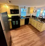Spacious one bedroom carriage house center of town two blocks from the beach!