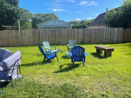 Enjoy views of beautiful Houghton Lake in charming LARGE home that sleeps 10.