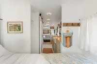 Renovated 1970’s retro camper on Bayou Grande in Pensacola with walking trail.