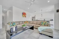 Tropical Private Oasis with heated pool just a short walk away from 4 mile beach