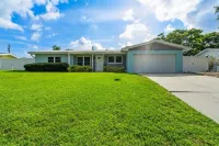 Hot Tub, Heated Pool, Mini Golf  Island Vibes Hotels in Pinellas County