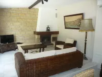 Spacious apartment in villa with large private garden and terrace near the sea