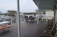 Dog Friendly! Non-Smoking. Cottage w/Dock and Deep Water Access on Natural Canal Hotels in Ocean Isle Beach