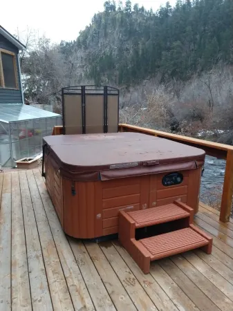 Paradise by the Creeks edge, hot tub overlooking creek, bar area w/ music BT