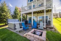 Lake Front Home w/ Hot Tub, Fire pit, yard, walk to Wisp Resort,Tubing Hill View