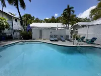 Cozy Poolside Cottage with Tropical Gardens - Charming Island Retreat