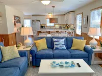 Waterfront Views and Shared Pool - Modern Coastal Retreat