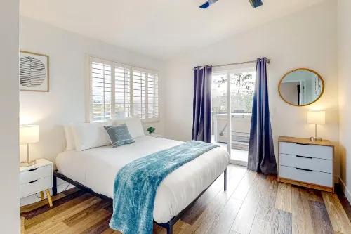 Breezy dog-friendly house with hot tub, central AC, game room, & washer/dryer