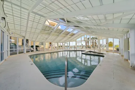 Swimming Pool and Fitness Center - Stylish Coastal Retreat