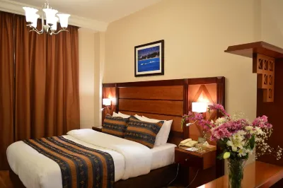 Comfort Hotel Suites Hôtels à proximité de l'Aéroport international Reine-Alia