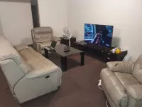 A single room is available in a spacious, well-furnished house.