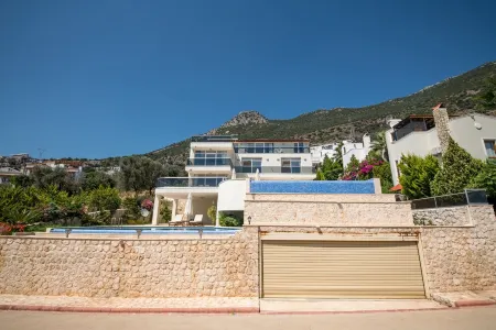 VİLLA NO COMPARE 6 BEDROOM AND 2 LIVING ROOM WITH 2 BIG SWIMING POOL IN KALAN Отели рядом с достопримечательностью «Kalamar Beach Club»