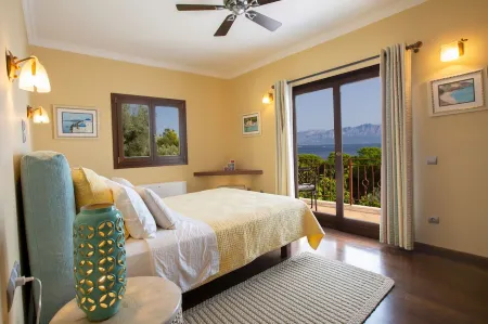 Private waterfront villa with pool and two private beaches