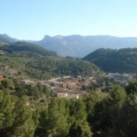 Accommodation on harbor and beach with mountain views