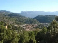Accommodation on harbor and beach with mountain views