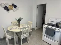 The Cozy Cottage is an inviting 2-bedroom house in Spanish Wells with Golf Cart