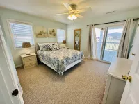 Beachfront 5-bedroom vacation home steps to the beach with hot tub!
