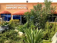 Sharjah International Airport Hotel Отели в г. 