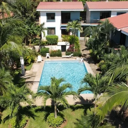 Minimalist Condo with a Beautiful New Design, Enclosed Patio, and Shared Community Pool