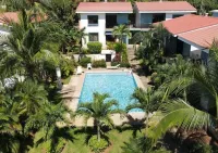 Minimalist Condo with a Beautiful New Design, Enclosed Patio, and Shared Community Pool