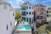 Steps to Beach Infinity Pool Hot Tub Game Room Coastal Marsh by AvantStay
