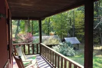 Cottage beside a waterfall