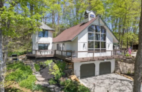 Unique and secluded A frame home on 31 acres with hot tub.