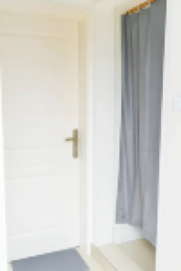 Cozy Guest Room in Kinshasa with Balcony and Partial Air-Conditioning