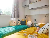 Comfortable caravan in a green setting