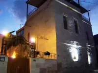 Monte Cappa Cave House Hotels in Karlik Koyu