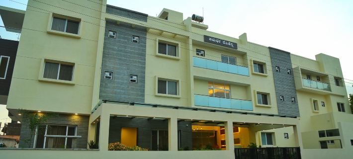 Samarth Residency Отели в г. Коппал