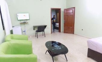 Posh Apartments and Hotel