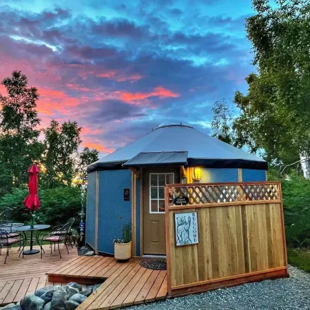 Fanciful mountainside yurt with private bathhouse