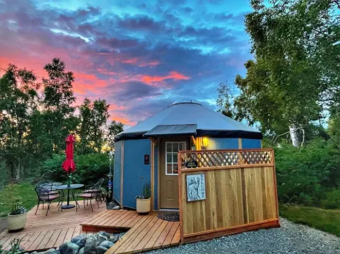 Fanciful mountainside yurt with private bathhouse