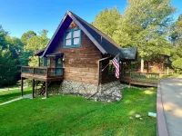 Enjoy a Cabin Including Blueberry Picking, Yard Games, Fire Pit, Screened Porch.