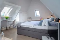 Cozy 1-room apartment with box-spring bed Hotels in Tinnum