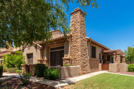 Walk to the Wigwam from this charming single-level condo!