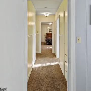 Home adjacent to Country Club, near Hospitals, Park, College and shopping.