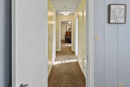 Home adjacent to Country Club, near Hospitals, Park, College and shopping.