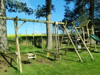 Manor house set in five acres of gardens with private golf course, near Ludlow.