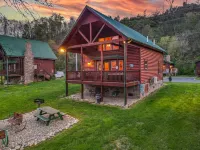 A Barrel of Fun- Riverfront Cabin with Hot Tub, No Steep Roads, Fishing Nearby