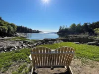 Johnson Homestead. One level living, ocean view with semi-private beach access.