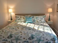 Relax at this beautiful Historic Intracoastal Waterlily Cottage + Game Room Hotels in Currituck County