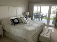 3 bedroom 2 bath Ocean front condo on marina with opt boat slip.