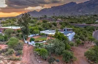Luxury Upscale Modern home located  in the Catalina Foothills. Sleeps 16
