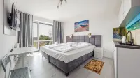 Apartamenty Sun & Snow Horyzont Hôtels à : Karwia