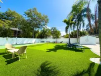 Shared Pool and Grilling Area with Fire Pit - Inviting Haven Hotels in Clearwater